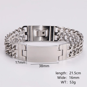 Detail of silver stainless steel Cuban bracelet with double curb chain and blank bar