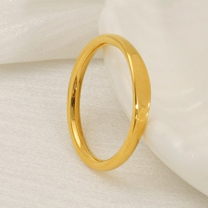 Minimalist 18K gold plated stainless steel ring on elegant white silk background