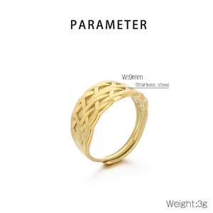 Detail view of 9mm wide gold stainless steel ring featuring a braided leaf texture
