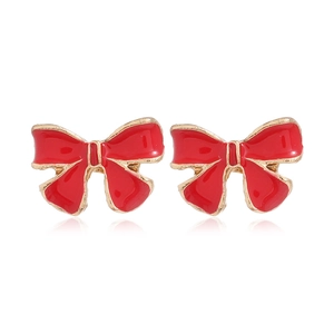 Détails de boucles d'oreilles nœud rouge en émail avec bordure dorée sur fond blanc