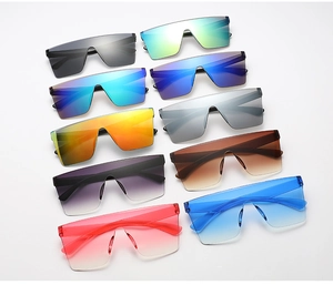 Detailed collection showing oversized flat top sunglasses in various gradient lens colors