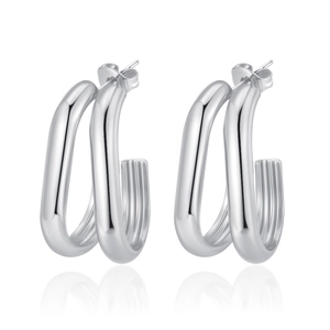 Detail view of silver U-shaped double-hoop stainless steel earrings with polished finish