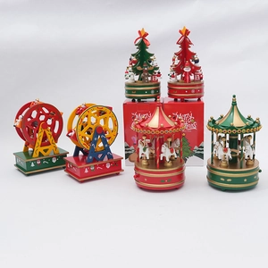 Wooden Christmas music boxes collection including carousel and Ferris wheel ornaments