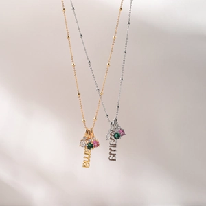 Customized name plate necklaces in gold and silver with colorful zircon gemstone accents