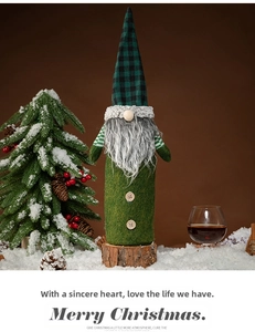 Christmas gnome wine bottle cover with green felt, wooden buttons and forest theme decor