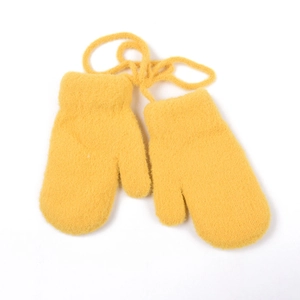Close-up of bright yellow plush mittens for babies with anti-lost hanging string