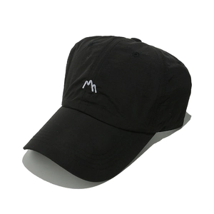 Detailed view of black quick-dry nylon baseball cap featuring mountain peak embroidery