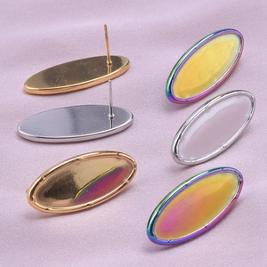 Macro view of 304 stainless steel oval stud earring findings in gold, silver and rainbow