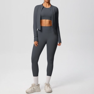 Three-piece dark grey workout set with slim-fit zipper jacket, sports bra, and leggings