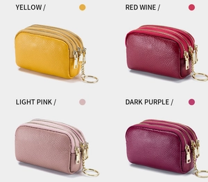 Detailed view of genuine leather mini coin purses in four colors with triple zippers