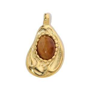 Detailed view of a vintage gold drop pendant with an oval amber stone inlay