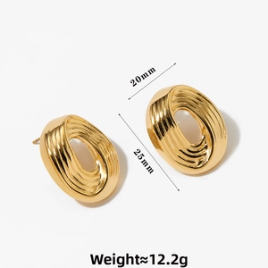 Detailed view of gold oval earrings with spiral texture, 20mm x 25mm size, 12.2g weight