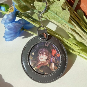 Grey faux leather keychain holder featuring Hu Tao character from Genshin Impact