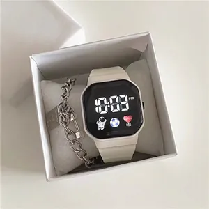 Space-themed digital watch set with silicone strap and metal chain in white box