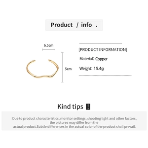 Detailed specs of gold wavy open bangle with 6.5cm diameter and 15.4g copper material