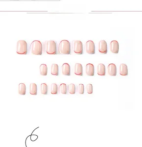 Detailed flat lay of 24pcs short round French press-on nails in nude pink and red