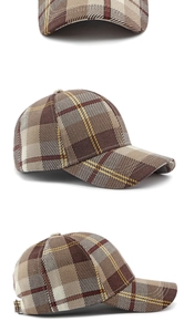 Close-up of adjustable metal buckle and plaid pattern detail on the cotton baseball cap