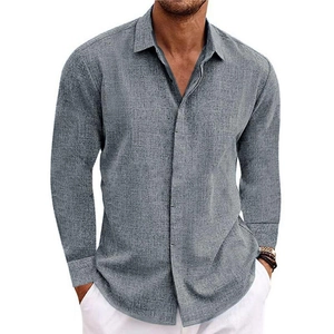 Detailed macro view of the grey linen texture and button cuff on a men's casual shirt