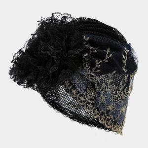 Elegant black lace turban cap with floral embroidery and large side flower decoration