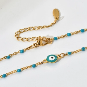 Golden stainless steel evil eye necklace with blue beads and lobster clasp closure