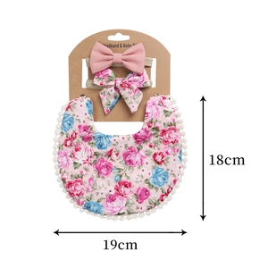 Baby floral bib and headband set with pom-pom trim and matching cotton bow accessories