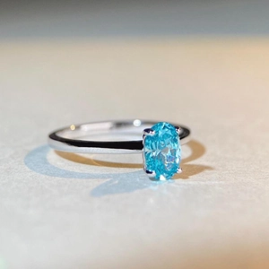Elegant S925 silver ring with 1ct oval aquamarine blue stone in four-prong setting
