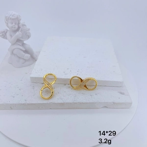 Macro detail of gold infinity jewelry clasp with micro-set zircons, 14*29mm size