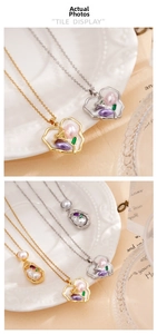 Detailed view of tulip pendants with enamel accents and pearls on elegant chain necklaces
