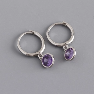 Detail of S925 sterling silver hoop earrings featuring a round purple zircon pendant