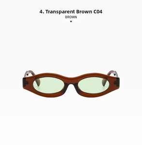 Close-up of transparent brown oval sunglasses frame with light green tinted lenses
