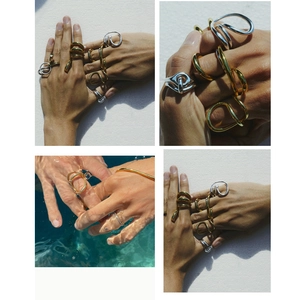 Minimalist irregular twisted gold and silver titanium steel rings and bangles set