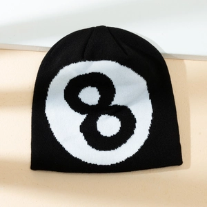 Minimalist black knitted beanie featuring a bold number 8 ball pattern for winter warmth