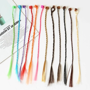 Close-up of colorful braided hair extensions with clips for girls in various vibrant shades