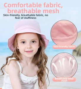 Pink kids bucket hat featuring breathable white mesh lining and soft sun protective fabric