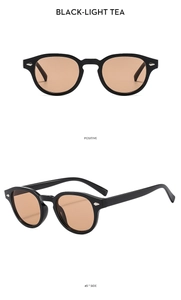 Front and 45-degree side view of vintage round sunglasses with black frames and tea lenses