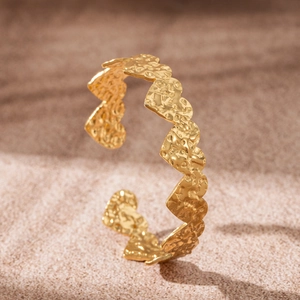18K gold-plated stainless steel open cuff bracelet with hammered heart pattern design
