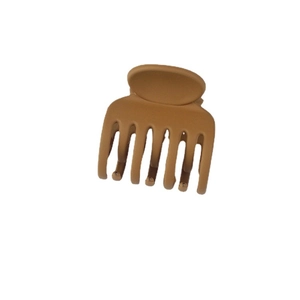 Matte brown claw clip for high ponytail styling with six teeth shown on white background
