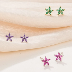 Detailed macro view of 925 silver petal stud earrings with colorful marquise-cut zircon stones