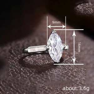 Elegant silver marquise cut ring 9x16mm with baguette side stones weighing 3.6g