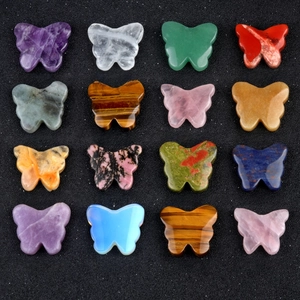 Assorted natural crystal butterfly ornaments in amethyst, quartz, and jasper stone types