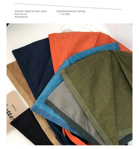 Flat lay of colorful nylon fabric textures for large capacity tote bags in various colors