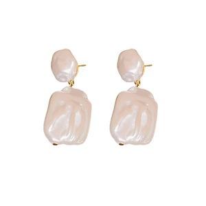 Elegant gold earrings with baroque pearls and pentagram charms in high-quality finish