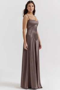 Detailed view of the chocolate satin evening dress with structured stitching and fine texture