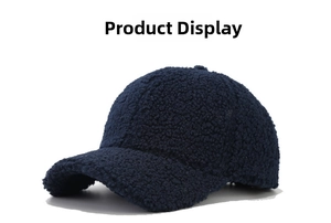 Detail shot of navy blue sherpa fleece baseball cap showing thick plush fabric texture