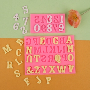 Pink silicone alphabet and number molds for vintage lace style fondant cake decorations