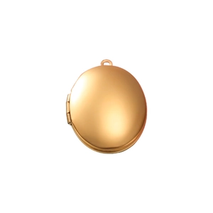 Macro shot of mirror-polished gold oval locket pendant with side hinge detail