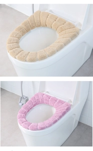 Detailed knit texture of thick beige and pink plush toilet seat covers for O-shaped basins