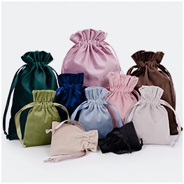 Detailed display of multi-colored velvet drawstring pouches in various sizes and finishes