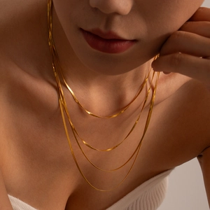 Elegant gold layered snake chain necklace in minimalist stainless steel for women