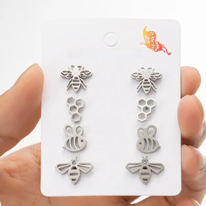 Set of 4 pairs of stainless steel bee and honeycomb stud earrings on display card